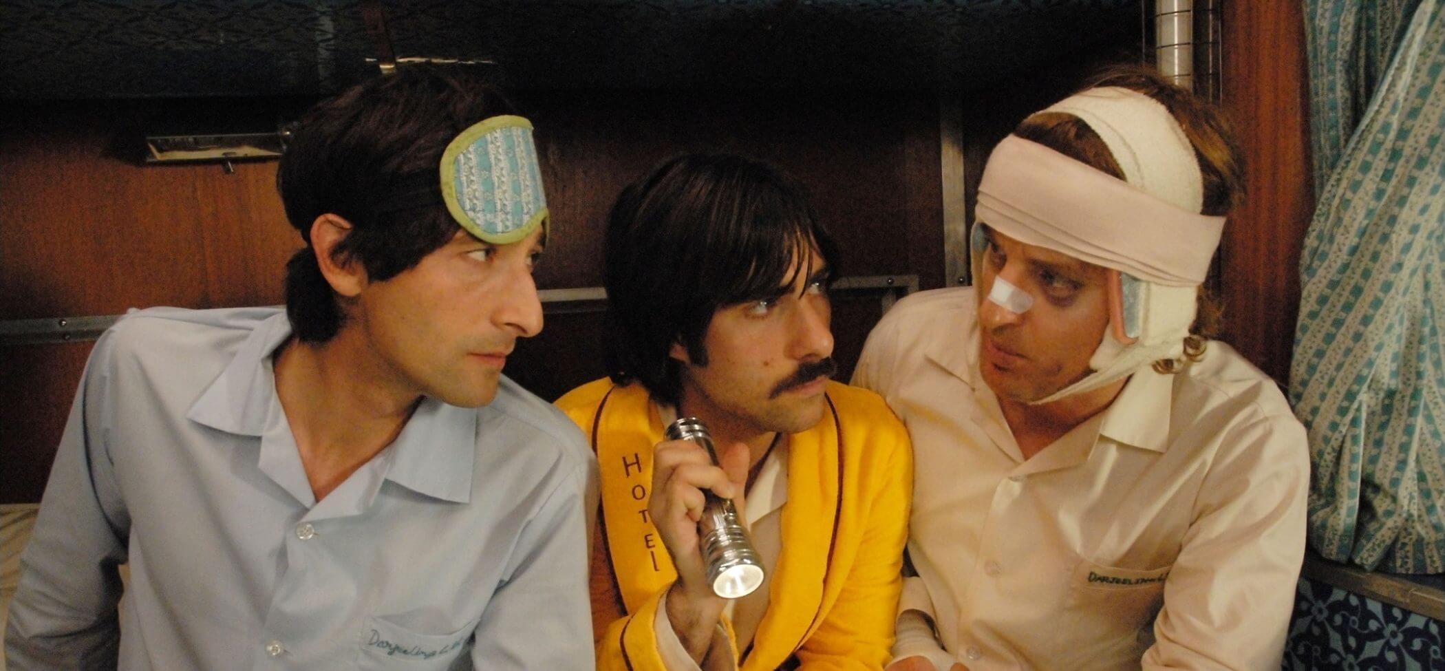  Adrien Brody, Jason Schwartzman, and Owen Wilson sitting in their sleeper car in The Darjeeling Limited (2007)